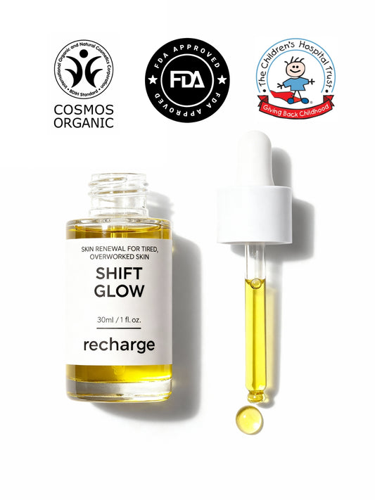 Shift Glow skincare product with dropper and certification logos on a white background